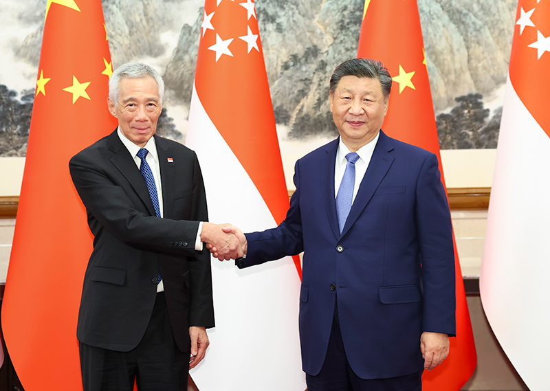 11月26日下午,国家主席习近平在北京钓鱼台国宾馆会见新加坡国务资政李显龙。
